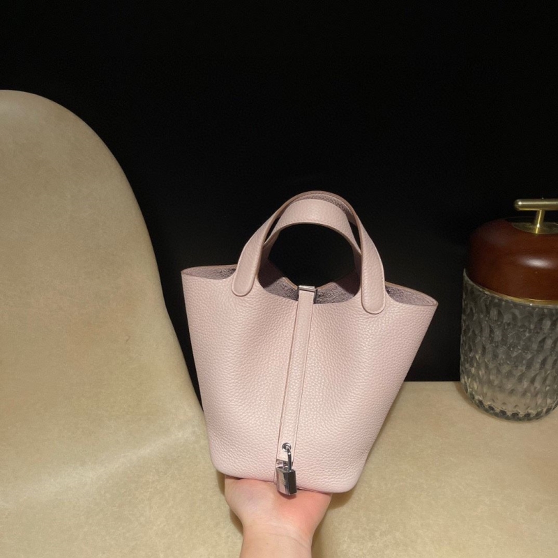 H**mes shopping bags